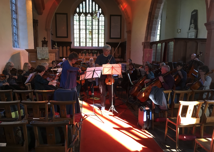 Orchestra in a church setting.