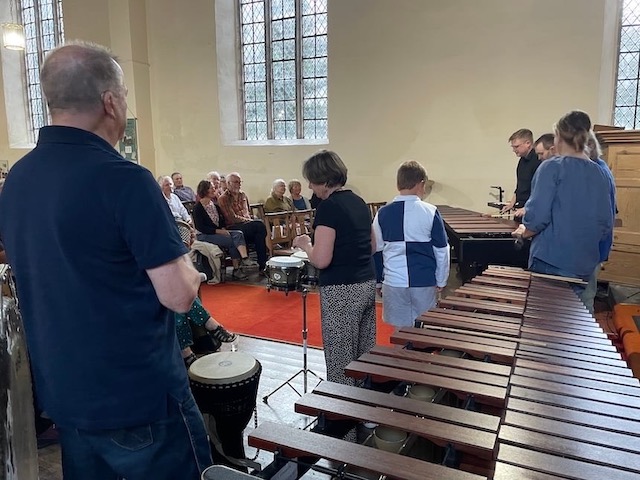 Audience participation with percussion instruments.