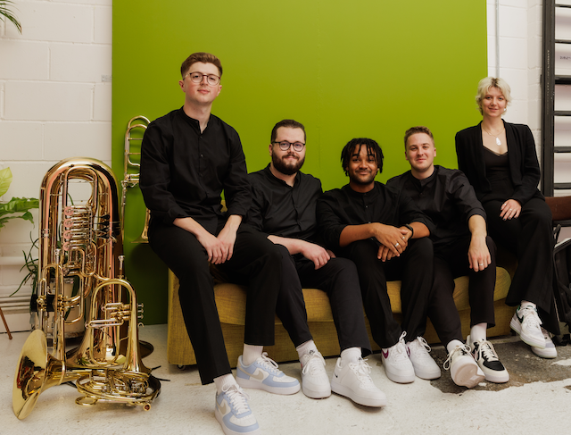 Brass ensemble with instruments.